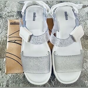 Super cute white/silver brand NWT, never worn, platform jellies!